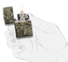 Front view of the Zippo Realtree Pattern Lighter in hand, open and lit