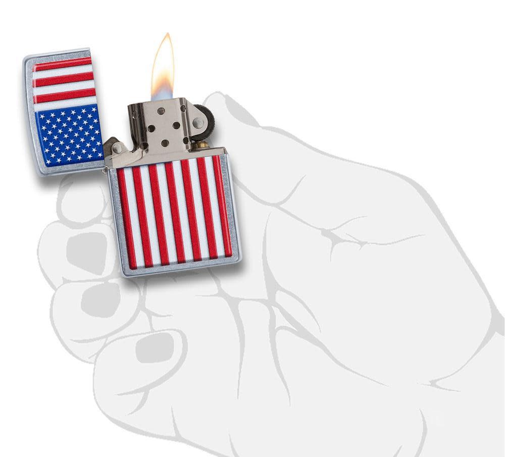 Patriotic Street Chrome Windproof Lighter lit in hand.