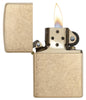 Armor® Tumbled Brass Windproof Lighter with its lid open and lit