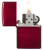 Classic Candy Apple Red™ Windproof Lighter with its lid open and lit
