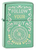 Follow Your Way High Polish Green Windproof Lighter facing forward at a 3/4 angle
