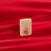 Lifestyle image of Heart Design Cream Matte Windproof Lighter standing on a red background