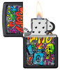 Zippo Street Art Design Black Matte Windproof Lighter with its lid open and lit