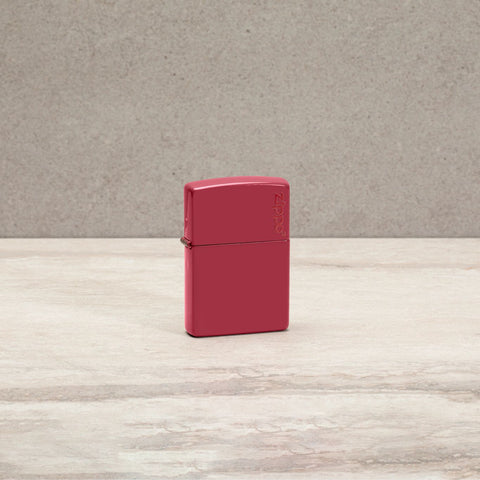 Lifestyle image of Classic Brick Zippo Logo Windproof Lighter standing on a countertop.