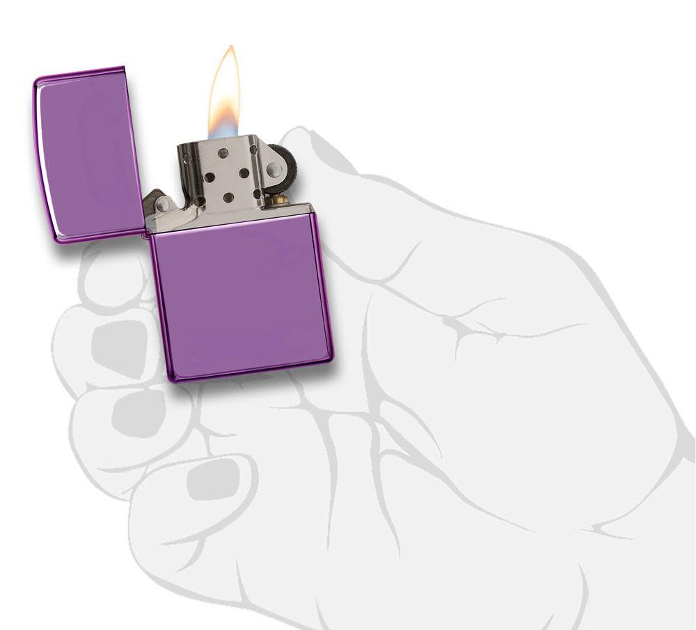 Classic High Polish Purple Windproof Lighter lit in hand