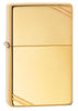 Front shot of High Polish Brass Vintage with Slashes Windproof Lighter standing at a 3/4 angle