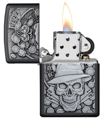 Gambling Skull Black Matte windproof lighter with its lid open and lit