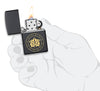 Gemini Zodiac Sign Design Black Matte Windproof Lighter lit in hand