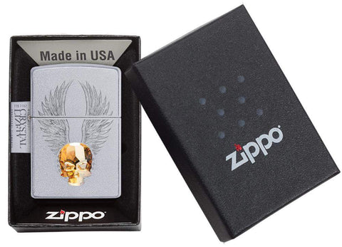 Front view of the Gold Skull Design Lighter with Skull Emblem in one box packaging 