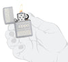 Zippo Design Windproof Pocket Lighter lit in hand.
