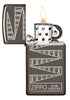 Slim® Black Ice® 65th Anniversary Collectible Windproof Lighter with its lid open and lit.