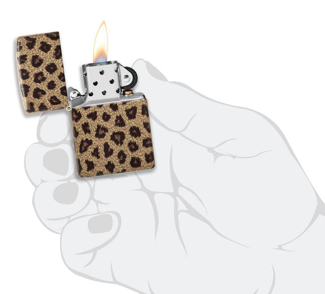 Leopard Print 540 Color Windproof Lighter lit in hand