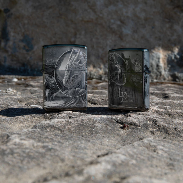 Lifestyle image of Lisa Parker Dragon design lighters, showing the front and back designs