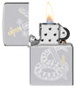 Zippo Snake Sword Tattoo Design Windproof Lighter with its lid open and lit.
