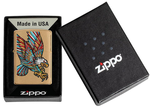 Tattoo Eagle Design Brushed Brass Windproof Lighter in its packaging.