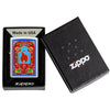 Zippo Design Windproof Lighter lit in hand.