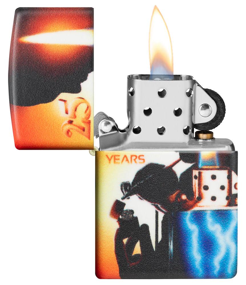 Mazzi® 25th Anniversary 540 Color Windproof Lighter with its lid open and lit.