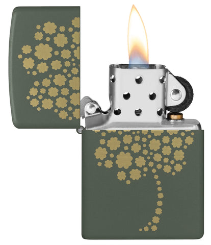 Zippo Four Leaf Clover Design Windproof Lighter with its lid open and lit.