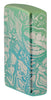 Laser 360° Tattoo Theme Design High Polish Teal Windproof Lighter standing at an angle, showing the front and right side of the lighter.