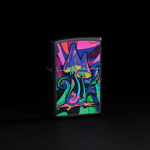 GIF of Black Light Trippy Mushroom Black Matte Windproof Lighter switching from glowing in the black light, to not glowing.