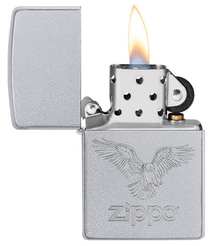 Zippo Landing Eagle Design Windproof Pocket Lighter with its lid open and lit.