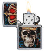 Skull King Design Street Chrome™ Windproof Lighter with its lid open and lit.