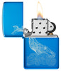 Whale Design High Polish Blue Windproof Lighter with its lid open and lit.